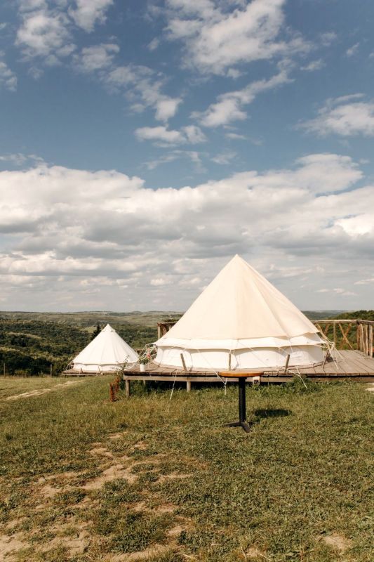 Tents on an open hillside