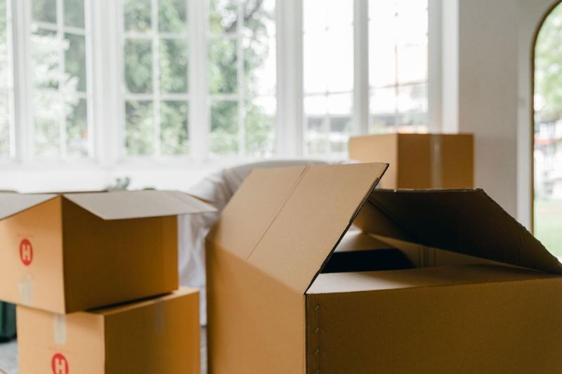Open boxes next to a window