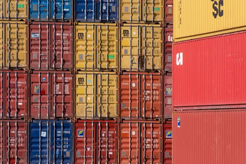 Wall of coloured containers