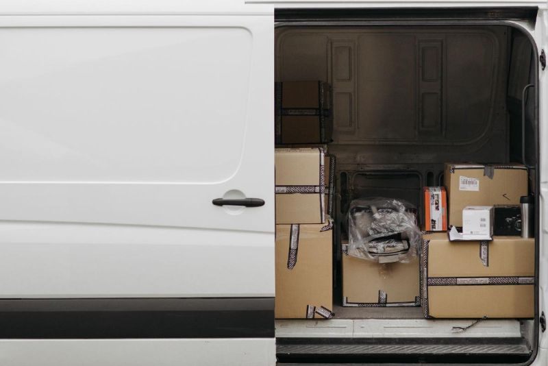 Inside of a white van with boxes