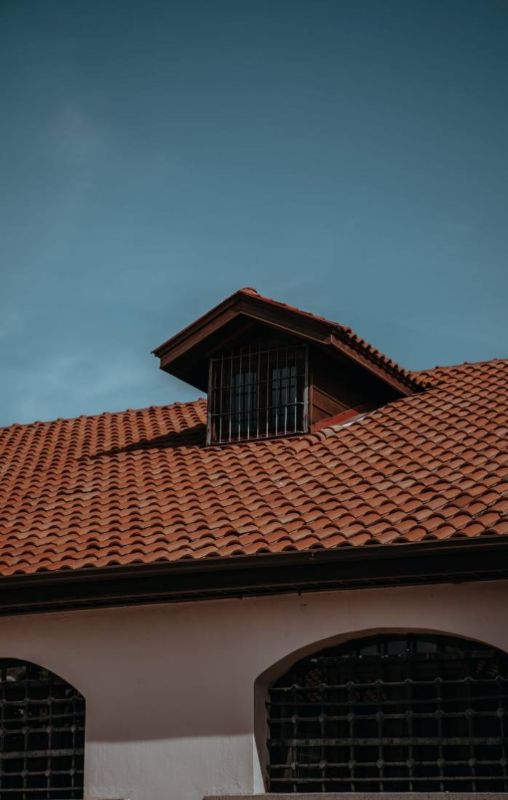 Dormer on a red-tiled roof